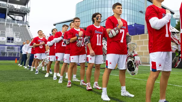 Richmond men's lacrosse team stands for the National Anthem before its game against Notre Dame on April 4, 2026