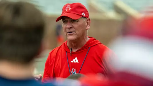 Russ Huesman addresses his team during the 2025 Spring Game