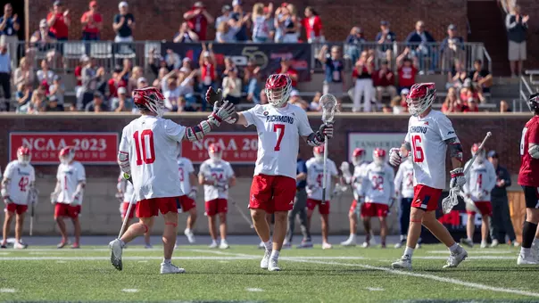 Joe Sheridan celebrates a goal with Gavin Creo during Richmond's Atlantic 10 semifinal win over UMass on April 30,2026
