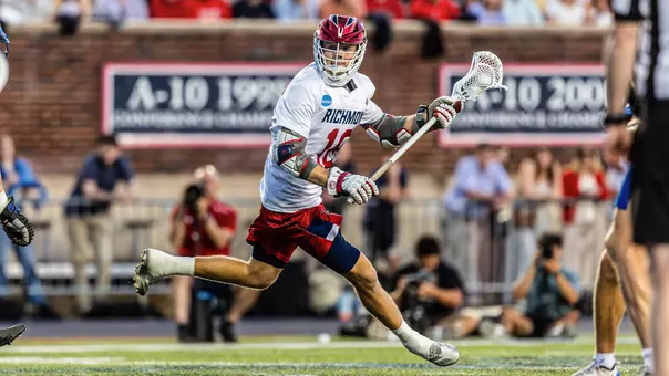 Jack Ricciardi carries the ball against Duke on May 9, 2026