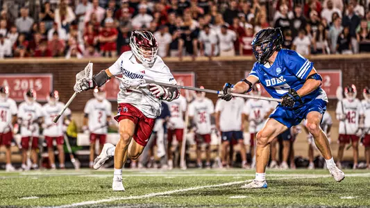 Joe Sheridan carries past a Duke defender on May 9,2026