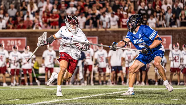 Joe Sheridan carries past a Duke defender on May 9,2026