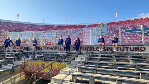 Spider student-athletes pose in Chile's Estadio Nacional