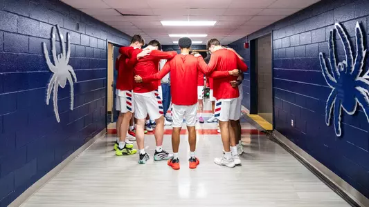 The Richmond Spiders gather in a huddle prior to pre-game introductions