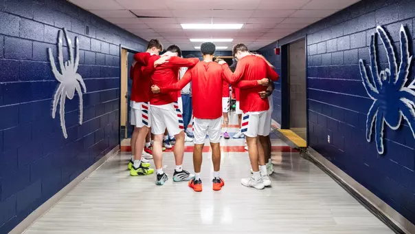 The Richmond Spiders gather in a huddle prior to pre-game introductions