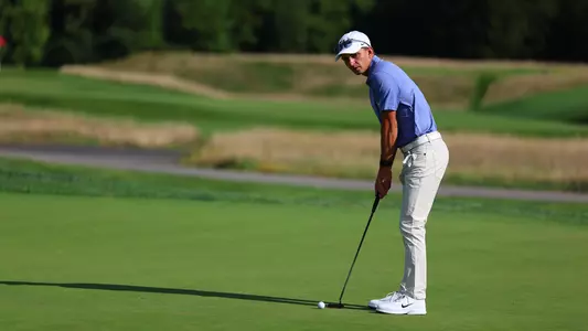 Mason deal putts on the green