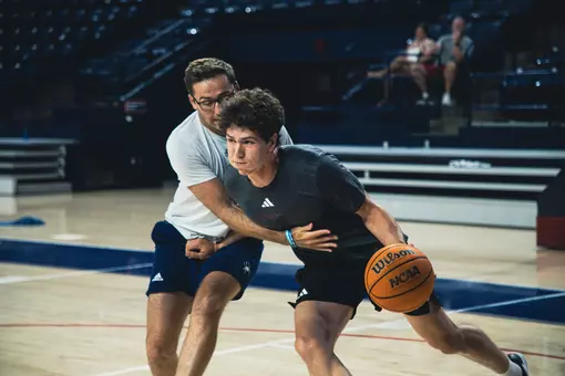 Derin Saran drives to the basket during a drill