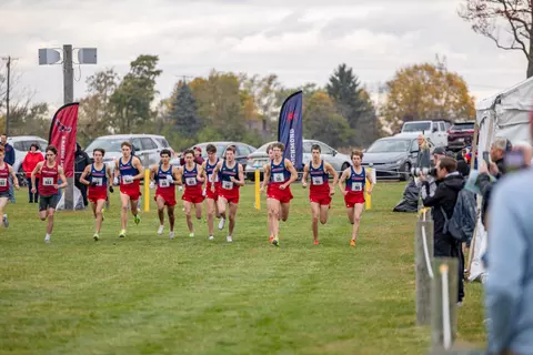 The cross country team races toward the camera