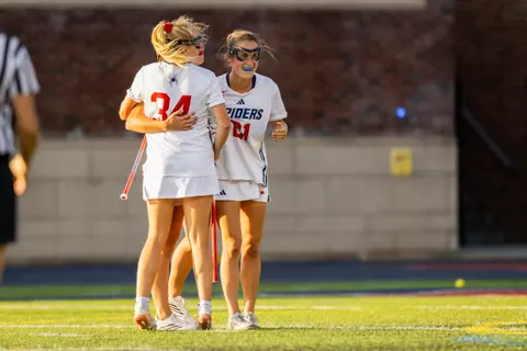 Members of the women's lacrosse team after a goal