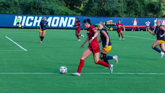 Emma Newman dribbling against ETSU