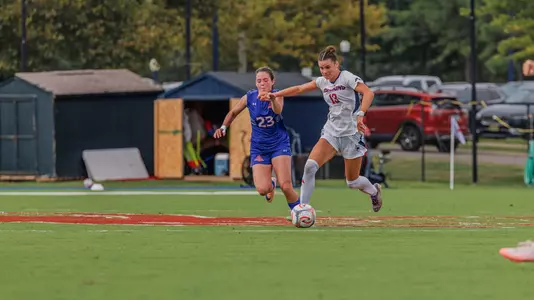 Emma Newman dribbles upfield