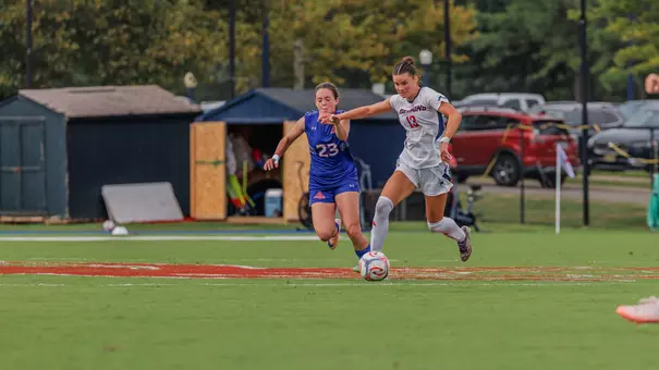 Emma Newman dribbles upfield