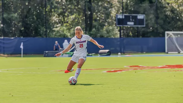 Gwen Howell clears the ball