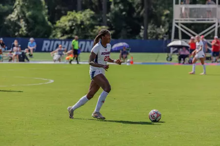 Logan Jackson chips the ball upfield