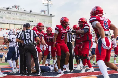 Bryce Allen celebrates a touchdown with his teammates on Aug. 29, 2026