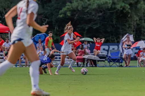 Morgane Zinn dribbles the ball upfield