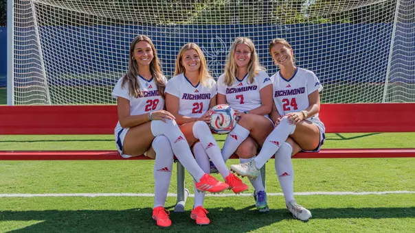 Members of Richmond soccer's 2026 senior class pose in front of a goal