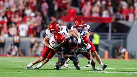 Jackson Thorne and company make a tackle against NC State on Sept. 11, 2026