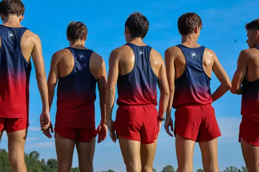 Members of the men's cross country time wait at the starting line