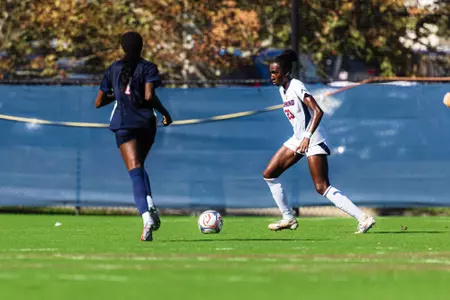 Logan Jackson handles the ball in her own half