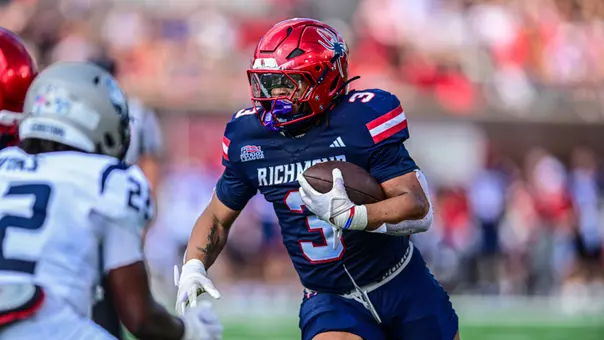 Aziz Foster-Powell carries the ball against Georgetown on Sept. 19, 2026
