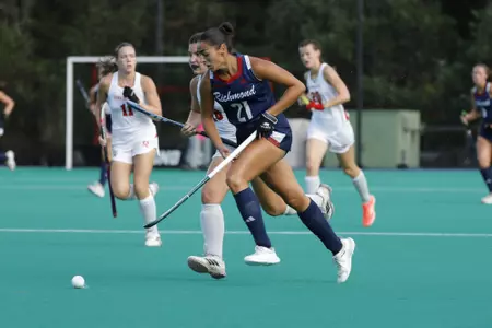 Malena Magnano drives the ball up the field