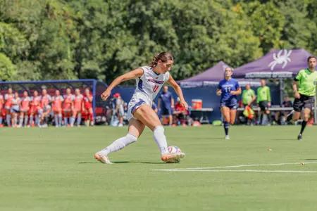 A Spider player cuts the ball inside