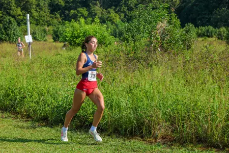 Ella Solorzano races in the Spider Alumni Open