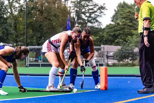 Elen Nicholls works the ball out of the corner against American