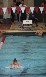 After starting with a five-event session in the morning, the two teams came back and swam seven events in the evening session.