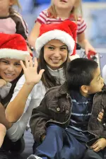 Brittany Magee and Kayla Hoffman and the rest of the Crimson Tide enjoyed a holiday party with the children of the RISE School in mid-December.