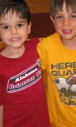 Sam Rowley and Will Pearson are among the dozens of boys and their dads attending Father/Son Basketball Camp