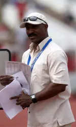 Harvey Glance is coaching the sprinters and hurdlers in Beijing.