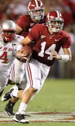 John Parker Wilson set Alabama's career total offense record in the first half Saturday.