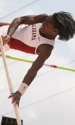 Lynda Cooper pole vaulted 12-11.50 to set a new school record.