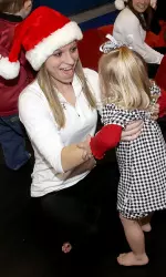 Senior Ricki Lebegern shares a laugh with a RISE student.