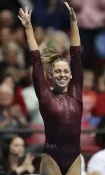 Junior Kassi Price scored a 9.9 on both the uneven bars and floor exercise Friday night.