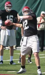 Greg McElroy at work during Friday's practice.