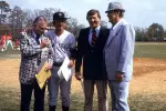 Bert Bank, Billy Martin, George Steinbrenner and Coach Paul Bryant before the 1978 exhibition game between Alabama and the New York Yankees at Sewell-Thomas Field.