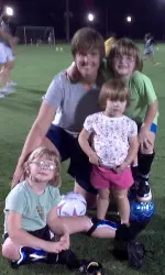 Nellie Barnes returned to the Capstone with her kids for the YMCA clinic.