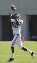 Earl Alexander catches a pass as the Tide prepares for North Texas Tuesday.