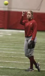 All-American Kelsi Dunne warms up in the Hank Crisp Practice Facility.