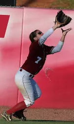 Junior Jennifer Fenton fields a fly ball.