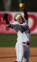 Alabama split its first doubleheader of the season.