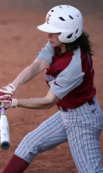 Jennifer Fenton hit a home run and drove in four against DePaul.
