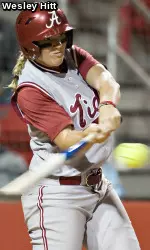 Junior Whitney Larsen hit a grand slam to end Alabama's first round game against Arkansas, 9-0 in five innings.
