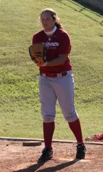 Freshman Jackie Traina works in a bullpen session.