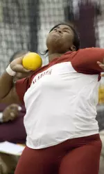 Holmes also competed in the shot put, finishing 14th on Saturday.