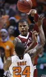Alabama's Charvez Davis (24) rebounds the ball against Tennessee's Josh Bone (24) during the first half of an NCAA college basketball game Saturday, Feb. 5, 2011, in Knoxville, Tenn. (AP Photo/Lisa Norman-Hudson)
