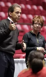 Saban talks with the gymnastics team as they make preparations for Regionals.